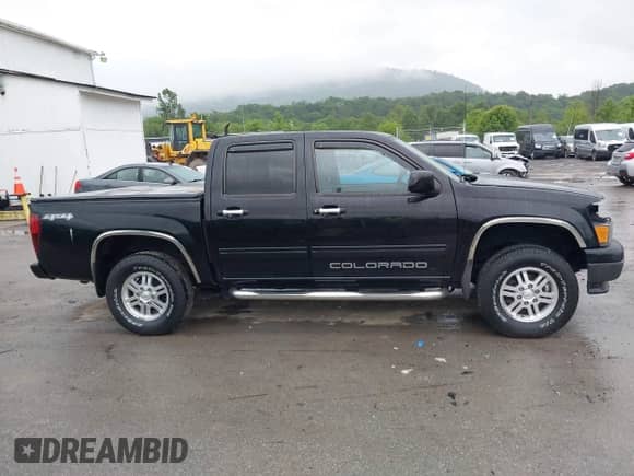 2012 Chevrolet Colorado 1LT с VIN 1GCHTCFEXC8165154, выставлен на аукционе IAAI как лот 42301986 с пробегом 166 527 миль миль и . История ставок и продаж доступна на DreamBid. Изображение 14.