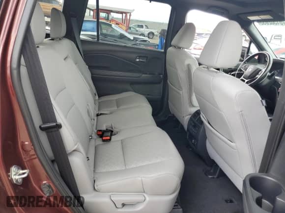 2019 Honda Passport Touring z VIN 5FNYF8H97KB016820, wystawiony jako Copart lot #61562855 z przebiegiem 41 772 mil mil oraz Szkoda całkowita • Salvage title. Historia ofert i sprzedaży dostępna na DreamBid. Obrazek 11.