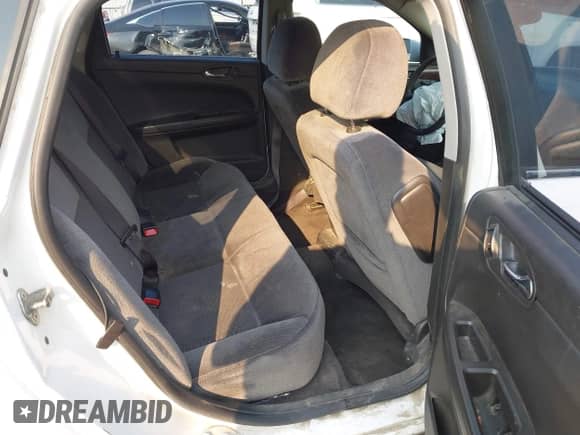 2013 Chevrolet Impala LS with VIN 2G1WF5E35D1240348, listed as a IAAI auction lot 43131336 with 137,558 mi miles and . Bid and sale history available at DreamBid. Image 8.