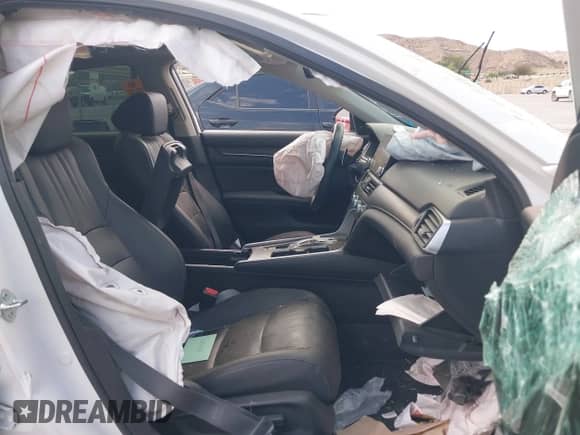 2022 Honda Accord Touring с VIN 1HGCV2F98NA007538, выставлен на аукционе IAAI как лот 43198661 с пробегом Не указан миль и . История ставок и продаж доступна на DreamBid. Изображение 5.