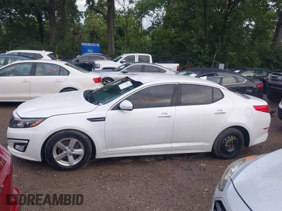 2014 Kia Optima LX с VIN 5XXGM4A70EG271412, выставлен на аукционе IAAI как лот 42913424 с пробегом 164 622 миль миль и . История ставок и продаж доступна на DreamBid. Изображение 14.