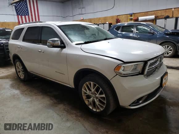2015 Dodge Durango Citadel with VIN 1C4SDJET6FC770619, listed as a Copart auction lot 57499815 with 134,278 mi miles and Clean title. Bid and sale history available at DreamBid. Image 4.