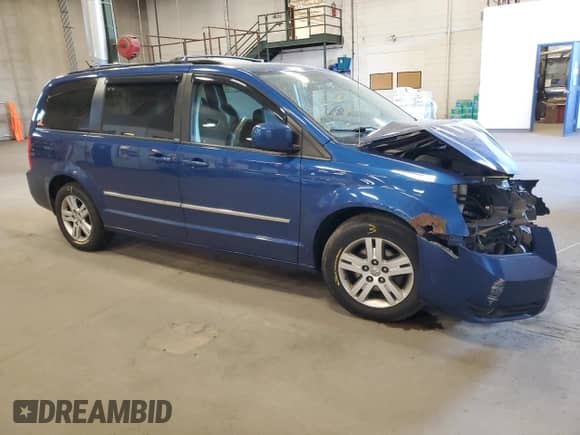 2010 Dodge Grand Caravan Crew with VIN 2D4RN6DX1AR455209, listed as a Copart auction lot 71793615 with 243,904 mi miles and Salvage title. Bid and sale history available at DreamBid. Image 4.