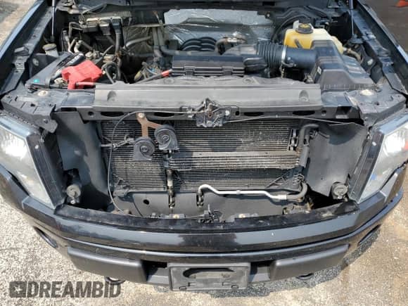 2013 Ford F-150 XLT с VIN 1FTFW1EF9DFC73937, выставлен на аукционе Copart как лот 58707605 с пробегом 199 613 миль миль и На запчасти • Non repairable. История ставок и продаж доступна на DreamBid. Изображение 11.