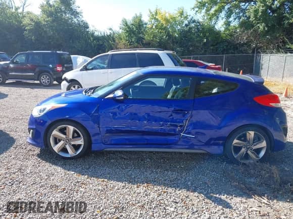 2013 Hyundai Veloster Turbo с VIN KMHTC6AE7DU140638, выставлен на аукционе IAAI как лот 43169612 с пробегом 162 811 миль миль и . История ставок и продаж доступна на DreamBid. Изображение 14.