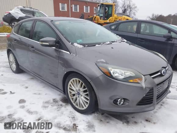 2014 Ford Focus Titanium with VIN 1FADP3N21EL401691, listed as a IAAI auction lot 41531275 with 116,602 mi miles and . Bid and sale history available at DreamBid. Image 1.