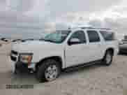 2014 Chevrolet Suburban LT with VIN 1GNSCJE05ER228150, listed as a Copart auction lot 64821065 with 252,740 mi miles and Salvage title. Bid and sale history available at DreamBid. Image 1.