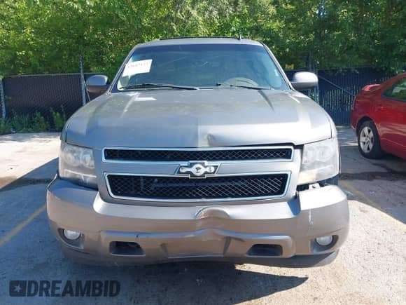 2009 Chevrolet Tahoe 2LT with VIN 1GNFK23009R103544, listed as a IAAI auction lot 42642422 with 300,378 mi miles and . Bid and sale history available at DreamBid. Image 12.