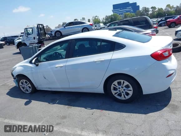 2019 Chevrolet Cruze LS z VIN 1G1BC5SM1K7101175, wystawiony jako IAAI lot #42964183 z przebiegiem 90 933 mil mil oraz . Historia ofert i sprzedaży dostępna na DreamBid. Obrazek 14.