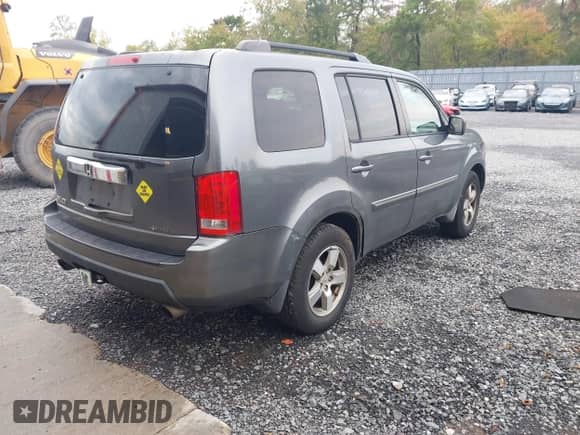 2010 Honda Pilot EX with VIN 5FNYF4H40AB017335, listed as a IAAI auction lot 43287495 with 243,117 mi miles and . Bid and sale history available at DreamBid. Image 4.