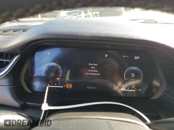 2023 Jeep Grand Cherokee Laredo with VIN 1C4RJHAG0P8710302, listed as a Copart auction lot 70679365 with 67,832 mi miles and Salvage title. Bid and sale history available at DreamBid. Image 9.