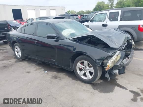 2012 Dodge Charger SE with VIN 2C3CDXBG2CH137983, listed as a IAAI auction lot 42769041 with 128,239 mi miles and . Bid and sale history available at DreamBid. Image 1.