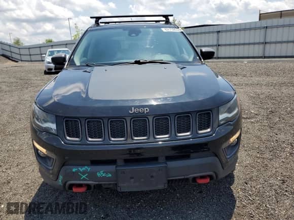 2017 Jeep Compass Trailhawk with VIN 3C4NJDDB6HT631761, listed as a Copart auction lot 62759555 with 94,528 mi miles and Salvage title. Bid and sale history available at DreamBid. Image 5.