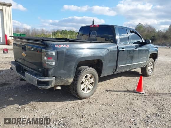 2014 Chevrolet Silverado 1500 LTZ z VIN 1GCVKSEC1EZ105678, wystawiony jako IAAI lot #41299817 z przebiegiem 142 014 mil mil oraz . Historia ofert i sprzedaży dostępna na DreamBid. Obrazek 4.