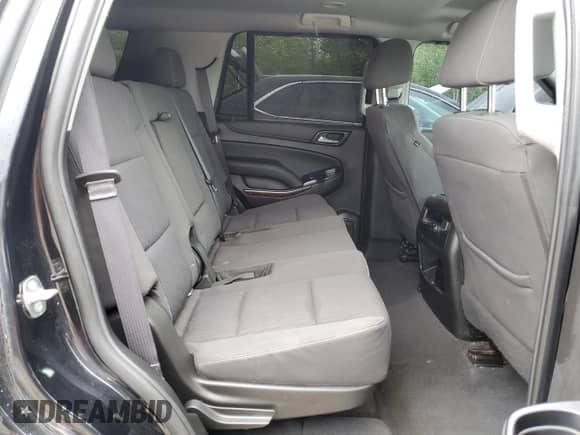 2020 Chevrolet Tahoe LS z VIN 1GNSKAKCXLR304282, wystawiony jako Copart lot #57853705 z przebiegiem 80 497 mil mil oraz Czysty tytuł • Clean title. Historia ofert i sprzedaży dostępna na DreamBid. Obrazek 11.