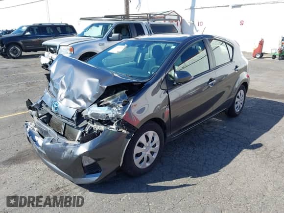 2014 Toyota Prius One z VIN JTDKDTB38E1070269, wystawiony jako IAAI lot #43241587 z przebiegiem 85 889 mil mil oraz . Historia ofert i sprzedaży dostępna na DreamBid. Obrazek 19.