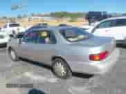 1995 Toyota Camry LE z VIN JT2SK12E1S0287944, wystawiony jako IAAI lot #43553190 z przebiegiem 205 910 mil mil oraz . Historia ofert i sprzedaży dostępna na DreamBid. Obrazek 3.