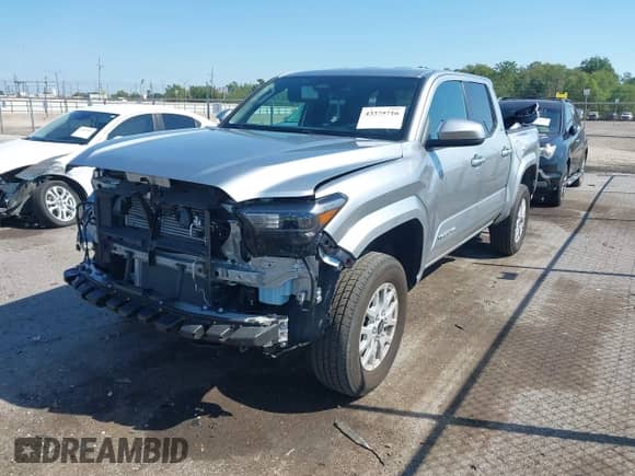 2024 Toyota Tacoma TRD Off Road with VIN 3TMLB5JN8RM010395, listed as a IAAI auction lot 43375716 with 20,319 mi miles and . Bid and sale history available at DreamBid. Image 18.