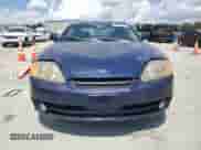 2003 Hyundai Tiburon GT с VIN KMHHN65F93U046097, выставлен на аукционе Copart как лот 66706235 с пробегом 158 369 миль миль и Списание • Salvage title. История ставок и продаж доступна на DreamBid. Изображение 5.