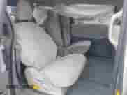 2014 Toyota Sienna LE z VIN 5TDJK3DC1ES080711, wystawiony jako IAAI lot #41910679 z przebiegiem 118 788 mil mil oraz . Historia ofert i sprzedaży dostępna na DreamBid. Obrazek 8.