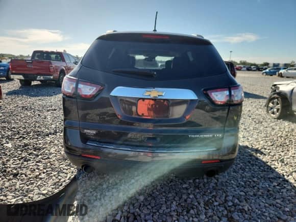 2015 Chevrolet Traverse LTZ z VIN 1GNKRJKD4FJ252395, wystawiony jako Copart lot #65991755 z przebiegiem 176 831 mil mil oraz Szkoda całkowita • Salvage title. Historia ofert i sprzedaży dostępna na DreamBid. Obrazek 6.