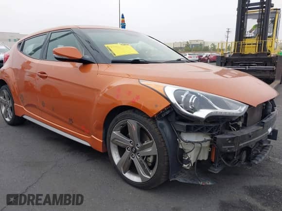 2013 Hyundai Veloster Turbo с VIN KMHTC6AE1DU128016, выставлен на аукционе IAAI как лот 42425892 с пробегом 104 209 миль миль и . История ставок и продаж доступна на DreamBid. Изображение 1.