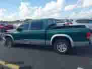 2003 Dodge Dakota SLT z VIN 1D7HL48N63S126377, wystawiony jako IAAI lot #42512610 z przebiegiem 202 720 mil mil oraz . Historia ofert i sprzedaży dostępna na DreamBid. Obrazek 14.