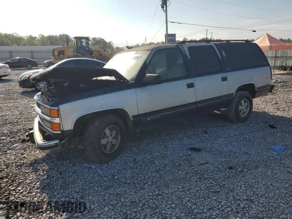 1994 Chevrolet Suburban with VIN 1GNEC16K1RJ410333, listed as a Copart auction lot 84595075 with 311,147 mi miles and Salvage title. Bid and sale history available at DreamBid. Image 1.