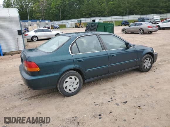 1997 Honda Civic z VIN JHMEJ8544VS002051, wystawiony jako Copart lot #58399195 z przebiegiem 239 283 mil mil oraz Szkoda całkowita • Salvage title. Historia ofert i sprzedaży dostępna na DreamBid. Obrazek 3.