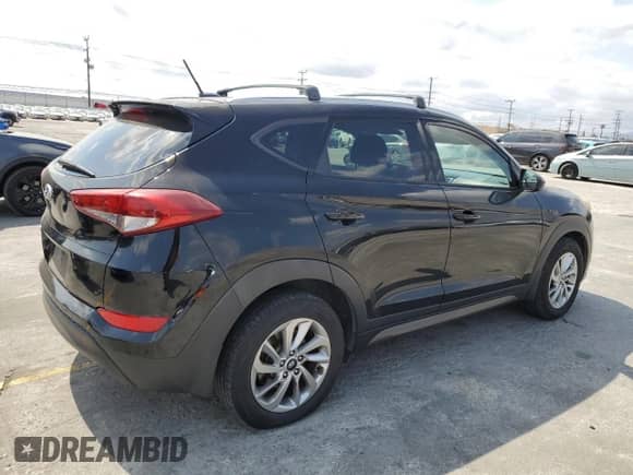 2016 Hyundai Tucson SE with VIN KM8J33A49GU238491, listed as a Copart auction lot 80437465 with 210,857 mi miles and Clean title. Bid and sale history available at DreamBid. Image 3.