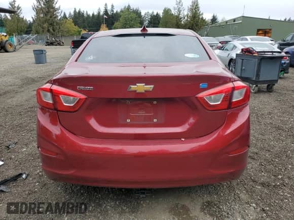 2018 Chevrolet Cruze LT z VIN 1G1BH5SE4J7233601, wystawiony jako Copart lot #72190954 z przebiegiem 88 940 mil mil oraz Szkoda całkowita • Salvage title. Historia ofert i sprzedaży dostępna na DreamBid. Obrazek 6.