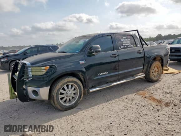 2012 Toyota Tundra with VIN 5TFEY5F12CX121183, listed as a Copart auction lot 57284005 with 381,527 mi miles and Clean title. Bid and sale history available at DreamBid. Image 1.