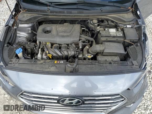 2018 Hyundai Accent Limited с VIN 3KPC34A38JE031087, выставлен на аукционе Copart как лот 56942635 с пробегом 129 692 миль миль и Списание • Salvage title. История ставок и продаж доступна на DreamBid. Изображение 11.