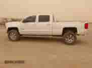 2016 Chevrolet Silverado 2500HD High Country z VIN 1GC1KXE80GF290043, wystawiony jako IAAI lot #41719644 z przebiegiem 122 715 mil mil oraz . Historia ofert i sprzedaży dostępna na DreamBid. Obrazek 14.
