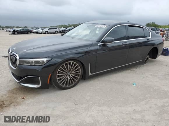 2022 BMW 7 Series 740i xDrive with VIN WBA7T4C06NCJ65806, listed as a Copart auction lot 62710535 with 33,260 mi miles and Salvage title. Bid and sale history available at DreamBid. Image 1.