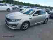 2015 Kia Optima LX with VIN 5XXGM4A75FG379610, listed as a IAAI auction lot 43074307 with 121,698 mi miles and . Bid and sale history available at DreamBid. Image 2.