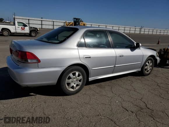 2002 Honda Accord SE with VIN 1HGCG66832A121967, listed as a Copart auction lot 85746045 with 180,224 mi miles and Salvage title. Bid and sale history available at DreamBid. Image 3.