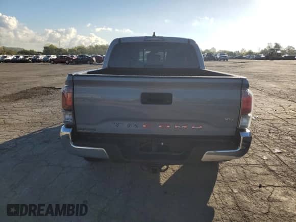2021 Toyota Tacoma SR with VIN 3TMCZ5AN1MM425739, listed as a Copart auction lot 84917565 with 77,559 mi miles and Clean title. Bid and sale history available at DreamBid. Image 6.