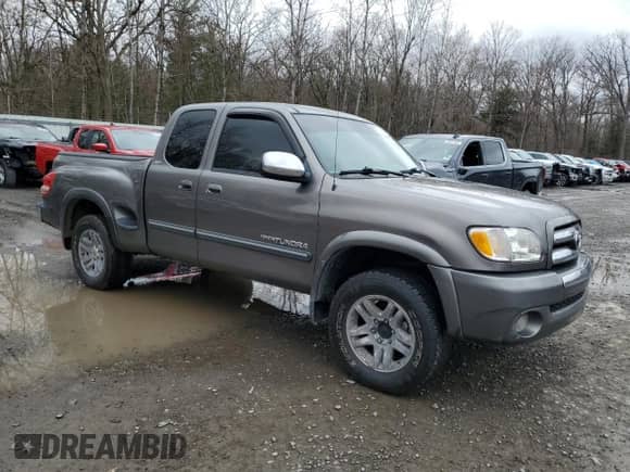 2004 Toyota Tundra SR5 с VIN 5TBBT44194S446136, выставлен на аукционе Copart как лот 52096405 с пробегом 89 077 миль миль и Чистый • Clean title. История ставок и продаж доступна на DreamBid. Изображение 4.