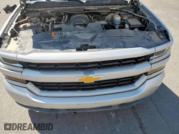 2018 Chevrolet Silverado 1500 Custom с VIN 3GCPCPEC6JG576691, выставлен на аукционе Copart как лот 70602085 с пробегом 120 698 миль миль и Списание • Salvage title. История ставок и продаж доступна на DreamBid. Изображение 11.
