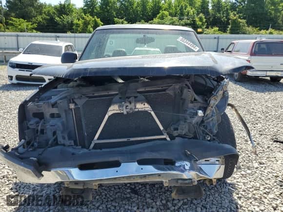 2005 Chevrolet Silverado 1500 Work Truck z VIN 1GCEC14V85Z138574, wystawiony jako Copart lot #59413614 z przebiegiem Nie podano mil oraz Szkoda całkowita • Salvage title. Historia ofert i sprzedaży dostępna na DreamBid. Obrazek 5.