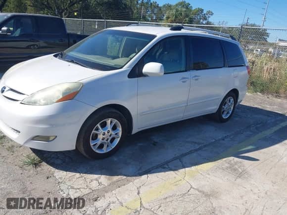 2006 Toyota Sienna XLE z VIN 5TDZA22C16S559859, wystawiony jako IAAI lot #43476816 z przebiegiem 87 250 mil mil oraz . Historia ofert i sprzedaży dostępna na DreamBid. Obrazek 2.