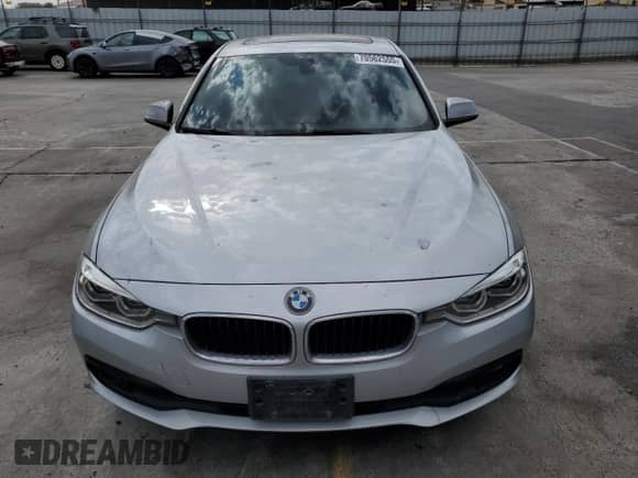 2018 BMW 3 Series 320i with VIN WBA8A9C50JAH13343, listed as a Copart auction lot 70562555 with 110,990 mi miles and Salvage title. Bid and sale history available at DreamBid. Image 5.