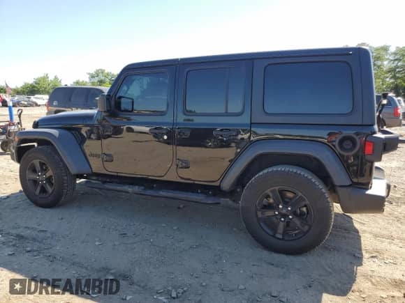 2021 Jeep Wrangler Unlimited Sport Altitude with VIN 1C4HJXDNXMW584814, listed as a Copart auction lot 69967945 with 122,907 mi miles and Salvage title. Bid and sale history available at DreamBid. Image 2.