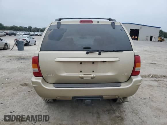 2001 Jeep Grand Cherokee Limited с VIN 1J4GX58N11C737807, выставлен на аукционе Copart как лот 82353575 с пробегом 156 723 миль миль и Списание • Salvage title. История ставок и продаж доступна на DreamBid. Изображение 6.