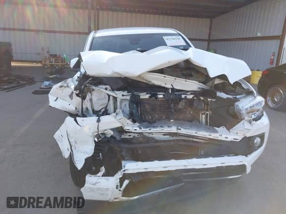 2021 Toyota Tacoma SR5 with VIN 3TMAZ5CN7MM146297, listed as a IAAI auction lot 43348248 with 46,809 mi miles and . Bid and sale history available at DreamBid. Image 6.