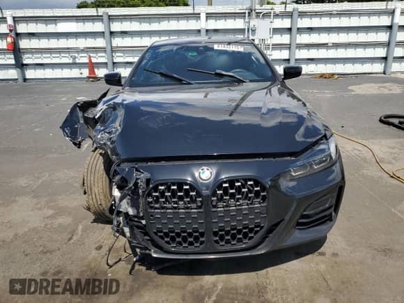 2022 BMW 4 Series 430i with VIN WBA53AP02NCJ83946, listed as a Copart auction lot 61433115 with 56,572 mi miles and Non repairable. Bid and sale history available at DreamBid. Image 5.