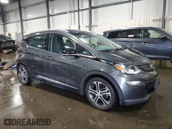 2018 Chevrolet Bolt EV Premier с VIN 1G1FX6S04J4108808, выставлен на аукционе Copart как лот 82117425 с пробегом 54 651 миль миль и Списание • Salvage title. История ставок и продаж доступна на DreamBid. Изображение 4.