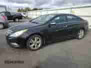 2012 Hyundai Sonata Limited с VIN 5NPEC4AC5CH350003, выставлен на аукционе Copart как лот 87188285 с пробегом 159 542 миль миль и Списание • Salvage title. История ставок и продаж доступна на DreamBid. Изображение 1.