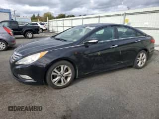 2012 Hyundai Sonata Limited with VIN 5NPEC4AC5CH350003, listed as a Copart auction lot 87188285 with 159,542 mi miles and Salvage title. Bid and sale history available at DreamBid. Image 1.